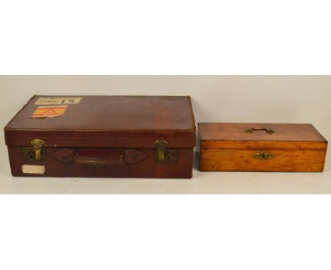 A vintage leather suitcase initialled "E.R.B.", 61 x 37cm, and a rectangular cutlery box with hinged lid (2).