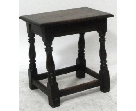 A reproduction oak joint stool with rectangular top and turned supports bearing ivory plaque inscribed "Edwin Nichols Ltd Wor