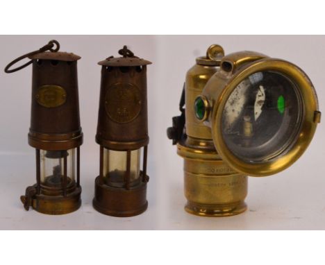 A vintage Eccles type SL M&Q safety lamp, by The Protector Lamp and Lighting Co Ltd, and a further example by Patterson Lamps