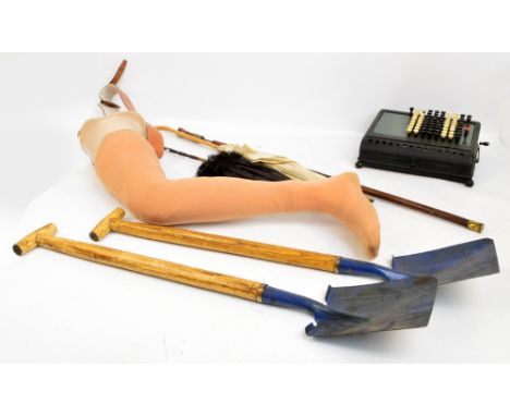 Two late 19th century parasols, a sword stick, two modern shovels and a prosthetic leg, also a vintage Burroughs calculator (