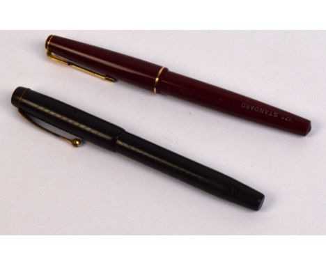 A vintage Parker fountain pen with gilt base metal mount and nib, and a further later boxed example (2).