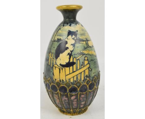 An early 20th century Amphora vase decorated with cat seated upon a gate, pattern no.1776, height 21.5cm. CONDITION REPORT: R