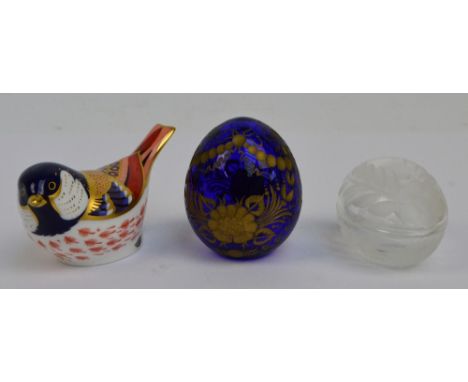 A Royal Crown Derby paperweight modelled as a coal tit, with gold plug, also a Derwent crystal glass egg shaped trinket box, 