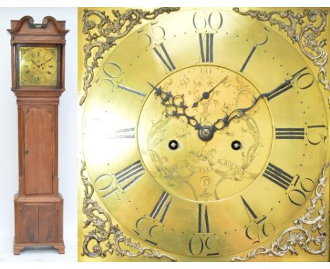 A 19th century mahogany longcase clock with broken pediment and eight day movement, the brass dial with applied decoration to