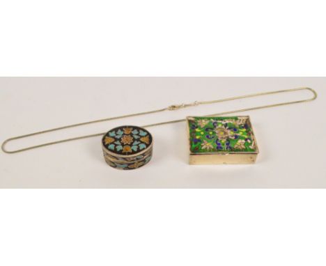 A 925 silver rectangular pill box with enamel decoration to the hinged lid, 4 x 3.5cm and a further similar oval example with
