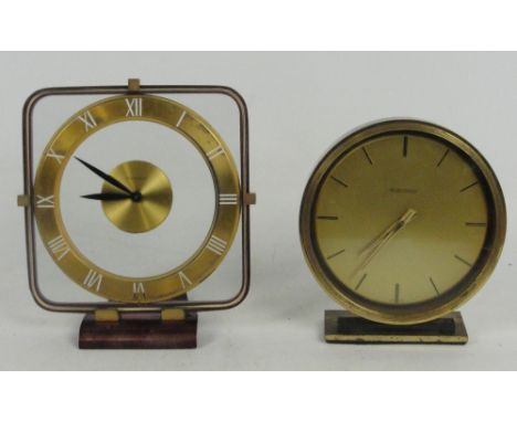 JAEGER-LECOULTRE; a 1930/40s Art Deco mantel clock with brass chapter ring between double glass, set with pierced Roman numer
