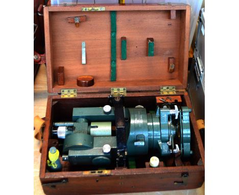 A cased Vickers Instruments theodolite, model Cooke V22, number V.221142, and a set of brass balance scales (badly af) (2).