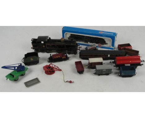 A quantity of model railway items including a boxed double O gauge Airfix engine, other double O rolling stock, quantity of t
