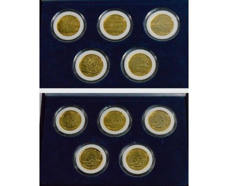 A cased set of Morgan Mint gold plated statehood quarter dollars, five in total, with certificate.