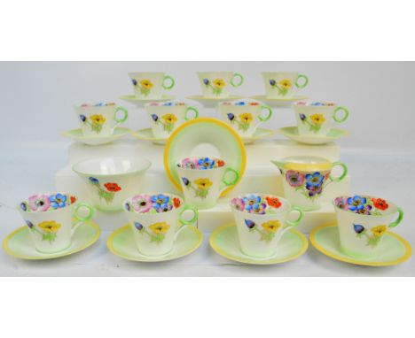 A Shelley twelve setting part tea service; W12072, comprising twelve cups, twelve saucers, jug and sugar bowl. CONDITION REPO