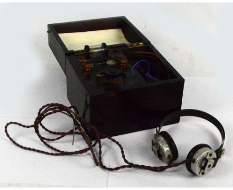 A vintage Chase crystal radio receiver in a wooden box inscribed "Chase Reliability Service Quality", registered no.465, and 