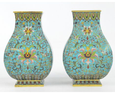 A pair of 19th century Chinese cloisonné enamel decorated brass vases of rectangular baluster form, overall decorated flower 