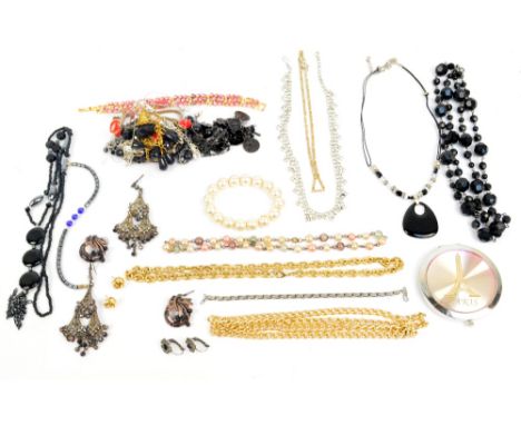 A group of costume jewellery including bracelets, necklaces, gilt chains and earrings, also a vintage French powder compact.