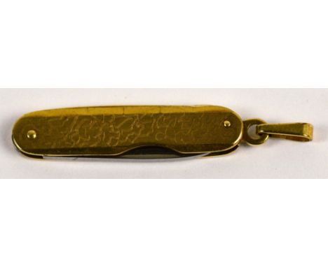 A 9ct gold miniature penknife with engraved decoration and with suspension ring, with steel blade, length 3.5cm when folded, 