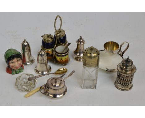 A small group of electroplated cruet items including a salt and pepper and mustard pot by Mappin & Webb, a three piece cerami