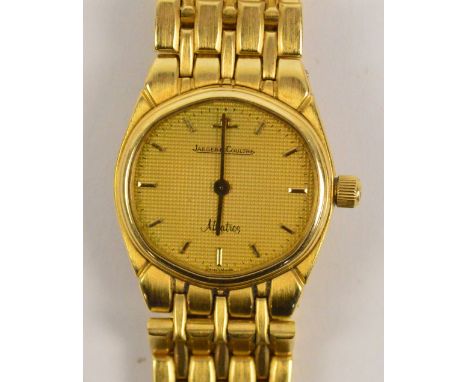 JAEGER LECOULTRE; a lady's 18ct yellow gold "Albatross" wristwatch with shaped dial set with gold batons, quartz movement and