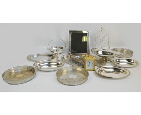 A quantity of plated items including a photograph frame, a pierced swing handle basket, galleried trays, serving dishes etc a