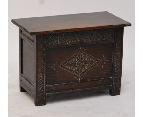 A G.T. Rackstraw Ltd of Worcester small carved oak reproduction coffer, width 68.5cm.