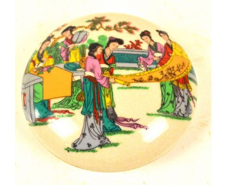 A 20th century Chinese porcelain crackle glazed circular paste box, transfer decorated with garden scene with females and wit