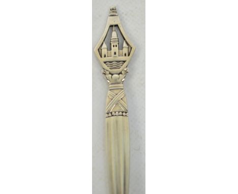GEORG JENSEN; a silver dessert spoon with pierced finial depicting the Copenhagen coat of arms, Jensen mark for 1915-1930, st