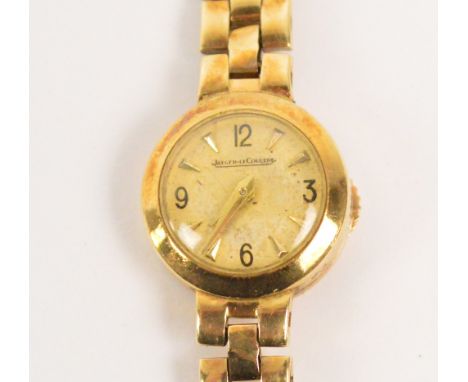 JAEGER-LECOULTRE; a 9ct yellow gold cased manual wind lady's wristwatch, the circular dial set with Arabic and baton numerals