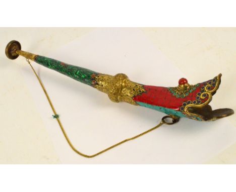 A 20th century Tibetan brass and enamel decorated horn with suspension chain, length 51cm.
