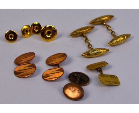 A pair of 19ct yellow gold cufflinks with overall engraved foliate scroll decoration, a single engine turned decorated exampl