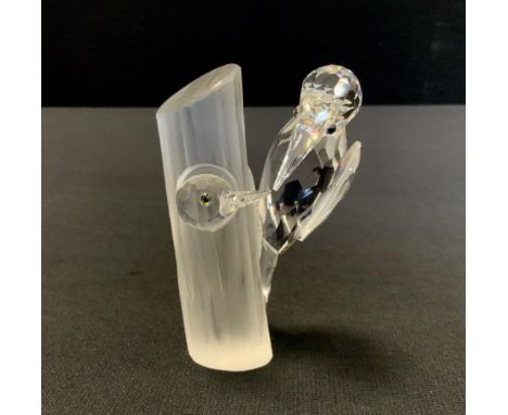 A Swarovski crystal annual edition Woodpecker from the Caring and Sharing series retired 1988, frosted trunk, 10.5cm high 