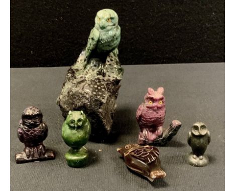 Carved stone figure of an owl possibly emerald,12cm high; model owl , possibly sugilite; craved owl on branch, possibly ruby;