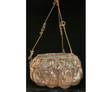 A wrought iron and blown pink glass ceiling light shade, three hanging chains, 38cm diameter 