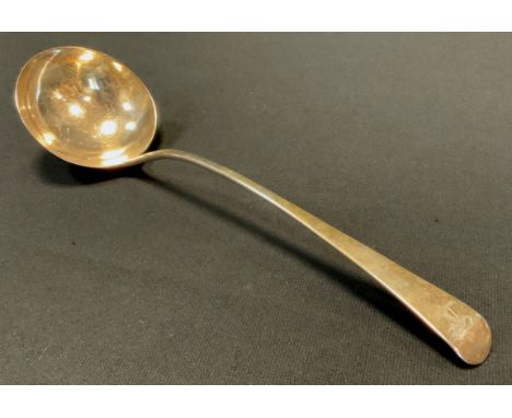 A George III silver soup ladle, the handle engraved with a Fist grasping a Scorpion, Thomas Wallis II, London 1806, 5.47ozt 