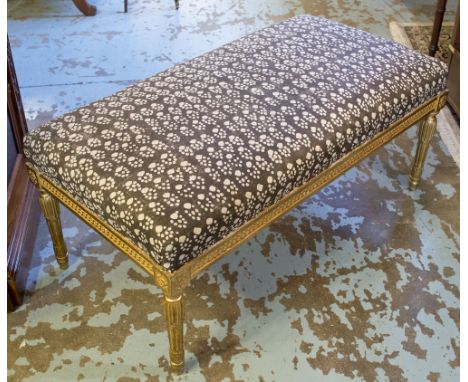 SOANE HEARTH STOOL, Louis XVI style giltwood upholstery in Soane 'batik brown' paws print cotton, 102cm W x 52cm D x 43cm H.