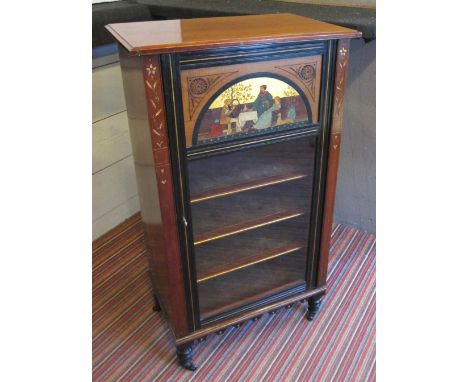 MUSIC CABINET, late Victorian Aesthetic walnut and ebonised with a panel decorated with figures and a dog over a glazed door 