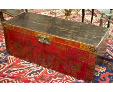 TRUNK, Chinese scarlet and black lacquer with gilt figure decoration and hinged top, 45cm h x 112cm w x 48cm D.