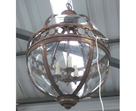 HANGING LANTERN, globular in a bronzed frame, 51cm diam. plus chain.