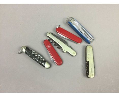 THREE VICTORINOX SWISS ARMY KNIVES,along with three vintage multi tool knives (6)