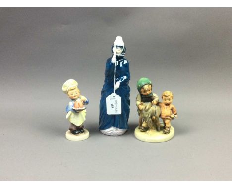 ROYAL DOULTON FIGURE OF 'MASQUE',22cm high, along with a Hummel group of children with a donkey and another Hummel figure (3)