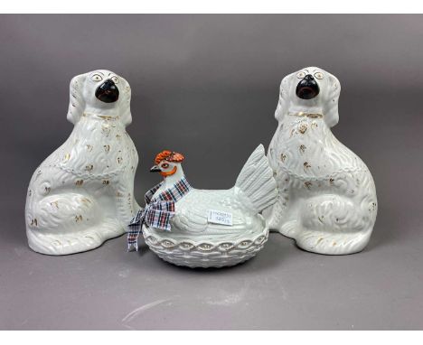 PAIR OF 20TH CENTURY STAFFORDHSIRE WALLY DOGS,31cm high, along with a ceramic cloaking hen (3)
