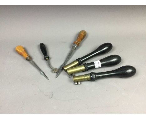 GROUP OF VICTORIAN CARPENTERS' TOOLS,including three implements with retractable blades and three book binders tools