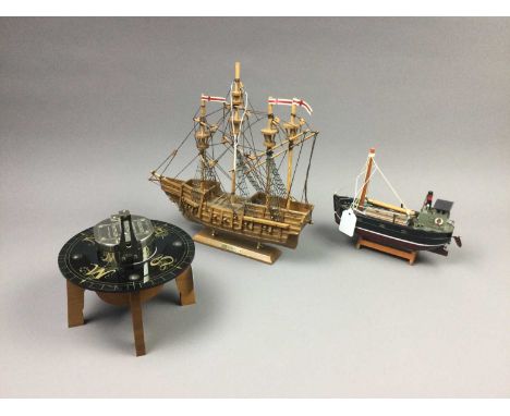 TWO MODEL SHIPS,comprising one titled the Maryrose, and a puffer, along with a tabletop compass on stand (3)