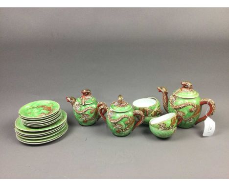 JAPANESE EGGSHELL TEA SERVICE,with dragons in relief, along with a Melba tea service