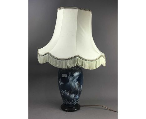 TWO FRENCH DRIMMER LAMP BASES,decorated in the Oriental taste, the larger with phoenix, butterflies and flowers, height exclu