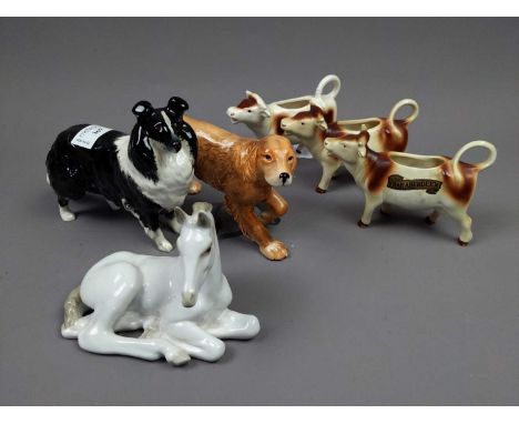 BESWICK FIGURE OF A SHEEP DOG,13cm high, along with a Royal Copenhagen figure of a bear, three cow creamers and other ceramic