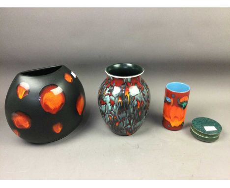 POOLE POTTERY VASE, 26cm high, along with two other Poole pottery vases and a Poole pottery circular lidded dish (4)