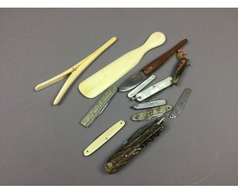 COLLECTION OF NINE VINTAGE FRUIT KNIVES,along with an Edwardian ivory shoe horn and a bone hair clip, also including a Manual