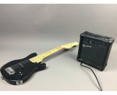 CHILD'S ELECTRIC GUITAR,in bag along with an amplifier