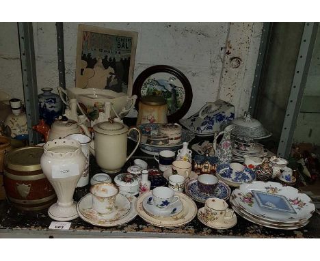 Shelf of china to include a cheese dish, teapots, flower arranging pots, plates etc, condition requests and additional images