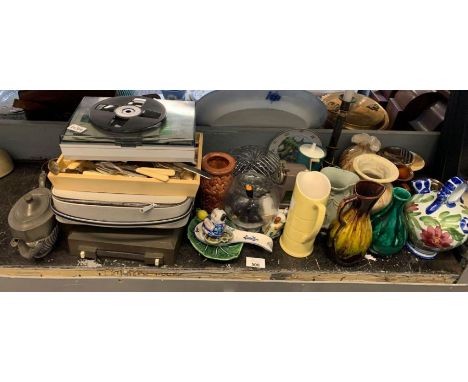 Half shelf to include boxed typewriter, cutlery, jugs etc condition requests and additional images will not be given for lots