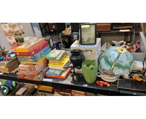 Shelf of puzzle's, large quantity of Commando books, Action Man style figure, vases, lights etc condition requests and additi