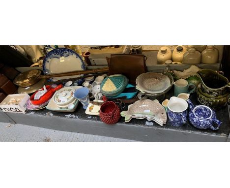 Shelf to include brass bed warmers, large blue &amp; white meat plate, fish plates, jugs, teapots etc condition requests and 